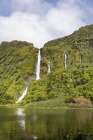 Azores, Portugal. Waterfall dropping into Lagoa dos Patos on Flores Island. Art Print